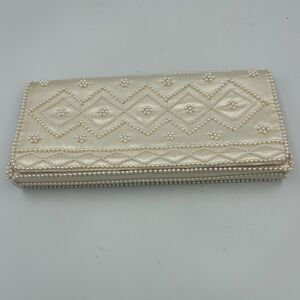 Elegant Pearl-Embellished Cream Clutch